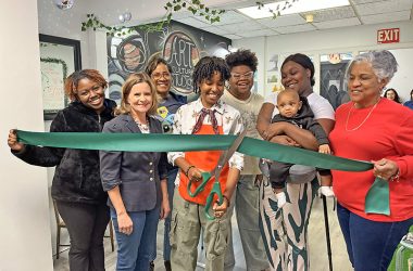 Flossmoor Mayor Michelle Nelson, second from left, joined Sydney Doss for the ribbon-cutting at her new business Art Culture Studios in downtown Flossmoor. Joining in the celebration are, from left) Cayley Jackson, Vinita Doss, Anaya Powell, Jada Wynn holding baby, and Patricia Hopkins. (Provided photo)