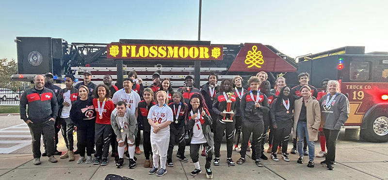 The Homewood-Flossmoor High School Special Olympics teams return to campus after winning the state championship soccer game Nov. 2. (Provided photo by Declan Flynn)