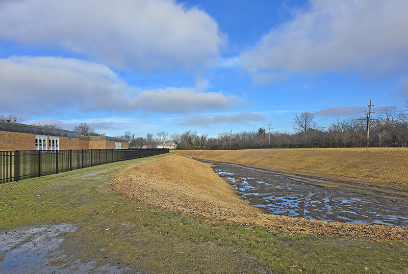A photo taken Dec. 30 shows the south end of the Heather Hill detention basin next to Heather Hill School. (Eric Crump/H-F Chronicle)