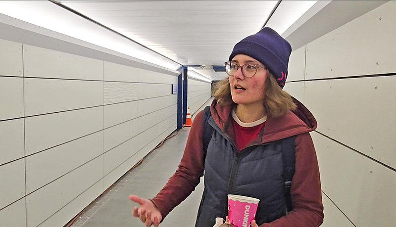 Commuter Chloe Kapica says she appreciates the rebuilt Homewood station's improved lighting and signage. (Eric Crump/H-F Chronicle)