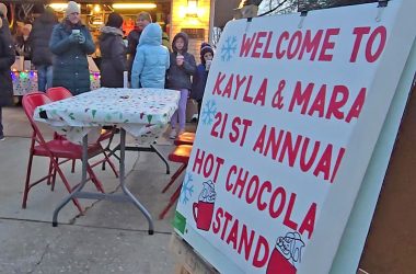 Sisters Kayla and Mara Winfrey of Homewood hold their 21st annual hot chocolate stand on Dec. 13 to benefit Toys for Tots. (Eric Crump/H-F Chronicle)