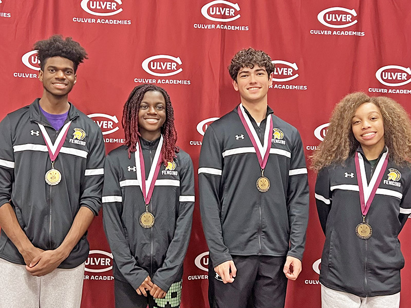 Members of the Marian Catholic High School fencing team brought home medals from a December competition at Culver Academy. The winners were, from left, Nathan Bannon, Michelle Asenjo-Bediako, Elijah Wagner and Brazil McGruder. (Provided photo)