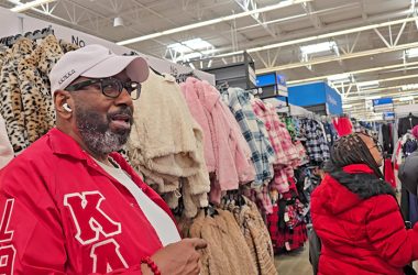 Chicago Heights Alumni Chapter of Kappa Alpha Psi Fraternity member Emanuel Cole explains how the "Shopping with a Kappa" program came to the Southland six years ago while escorting a student doing some holiday shopping. (Eric Crump/H-F Chronicle)