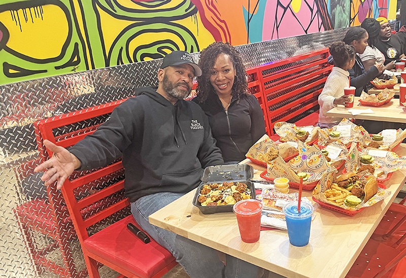 Instagram influencers The Black Foodies sample every level of hotness at Dave’s Hot Chicken. (Nick Ulanowski/H-F Chronicle)