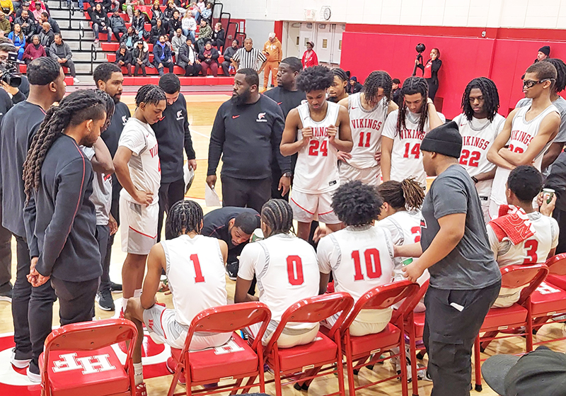 H-F coach Jamere Dismukes coaches his team during a timeout in the Vikings' 59-58 win over Joliet West on Jan. 20. (David P. Funk/H-F Chronicle)