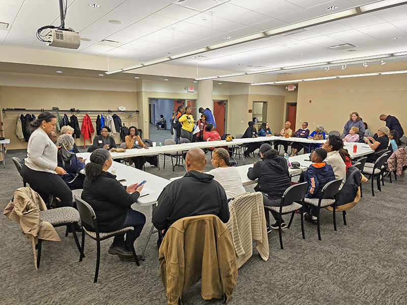 Early arrivals gather for the first meeting of the Heather Hill Civic Association at Flossmoor Public Library on Nov. 13, 2024. (Eric Crump/H-F Chronicle)