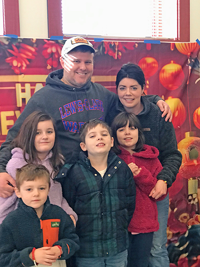 The Jeppson family returns to the Lunar New Year festival at Flossmoor Public Library for a second year. "They (the children) kept asking when are we going to do it again," said Emily Jeppson of Flossmoor. (Lolita Cusic/H-F Chronicle)