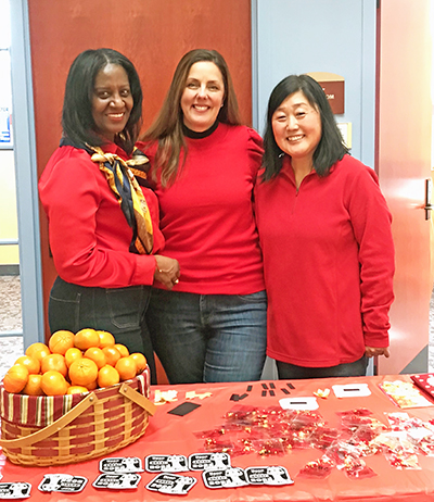 From left, Lunar New Year celebration organizers Phillippa Leon-Thompson, chair of the Flossmoor Community Relations Commission; Stephanie Wright, Flossmoor community engagement manager; and Molly Deugaw, member of the Flossmoor Community Relations Commission. (Lolita Cusic/H-F Chronicle)