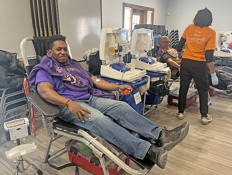 Omega Psi Phi Fraternity member Merlin Newirk donates blood at the annual MLK Day of Service blood drive at the Irwin Center. (Nick Ulanowski/H-F Chronicle)