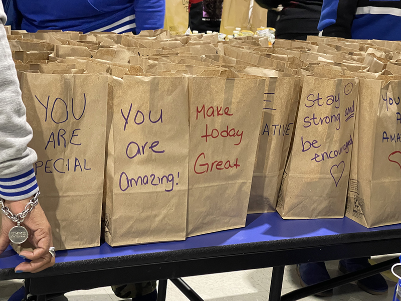 Lunches that volunteers put together for South Suburban PADS include messages of encouragement written on the bags. (Summer Kiswani/H-F Chronicle)