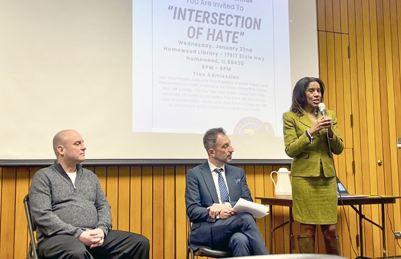 Cook County Commissioner Donna Miller speaks (right) alongside the two guest presenters, Vlad Khaykin (middle) and Jeff Schoep (left) at the "Intersections of Hate" event Wednesday, Jan. 22, at Homewood Public Library. (Summer Kiswani/H-F Chronicle)
