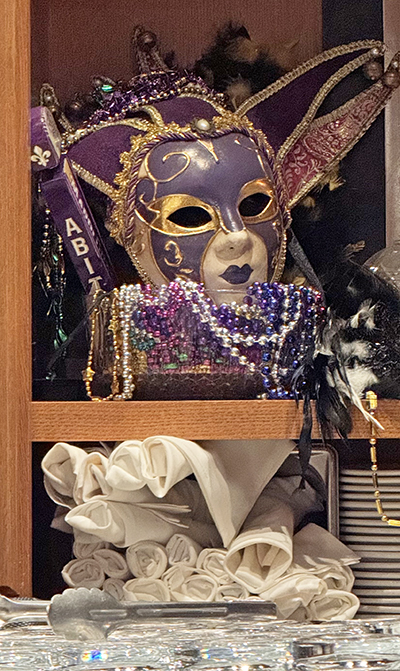 Mardi Gras mask adds to the ambiance of the Maple Tree. (Karen Torme Olson/H-F Chronicle)