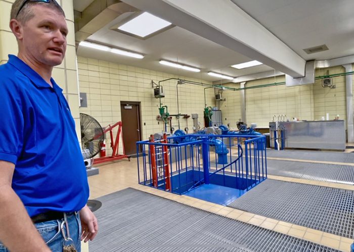 Eric Fritz, utility department supervisor, gives a water plant tour on May 17 to attendees at the Homewood Public Works Open House. (Summer Kiswani/H-F Chronicle)