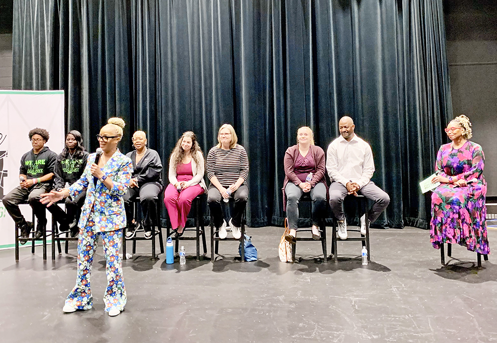 Carmela Wallace of Live Free 999 stands with panelists at Shatter the Silence, joined by Correy Bell, Sarah Whitson, Kofi Shuck, Teri McKean, Kizawanda Olowe, and HF student leaders during the school’s first mental health panel on May 5. (Nuha Abdessalam/H-F Chronicle)