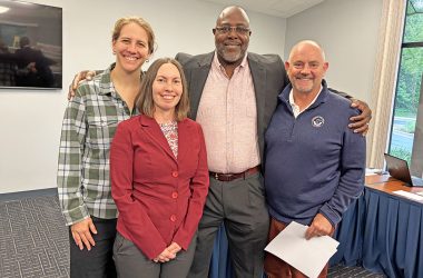 Current members of the Homewood-Flossmoor Park District Board of Commissioners Angie Codere, left, and Brent Bachus, right, welcomed new members Erika Schafer and Byron Walker to the board during the May 20 meeting. (Marilyn Thomas/H-F Chronicle)
