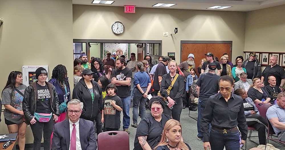 Rabid Brewing patrons file into the Homewood board room prior to the April 22 trustees meeting. A number of them spoke on behalf of Rabid Brewing's bid to buy village-owned property on West 183rd Street. (Eric Crump/H-F Chronicle)