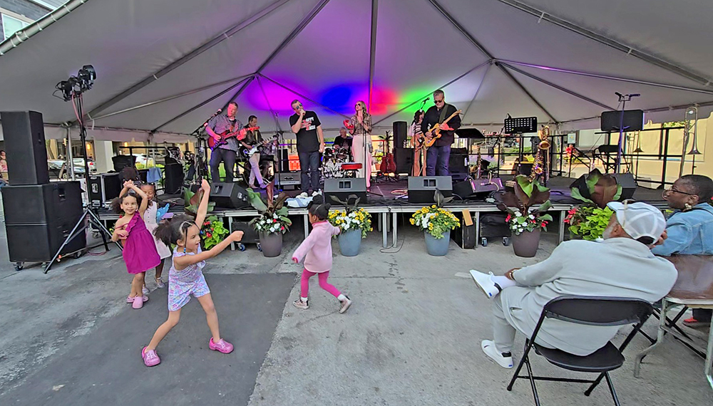 Not My Dad has youngsters rocking early in the band's set on Friday, June 6. (Eric Crump/H-F Chronicle)