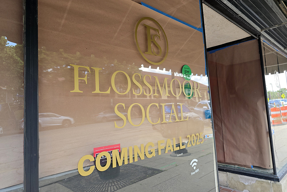 A sign in the window at 1040 Sterling Ave. indicates a new restaurant, Flossmoor Social, is expected to open this fall. (Eric Crump/H-F Chronicle)