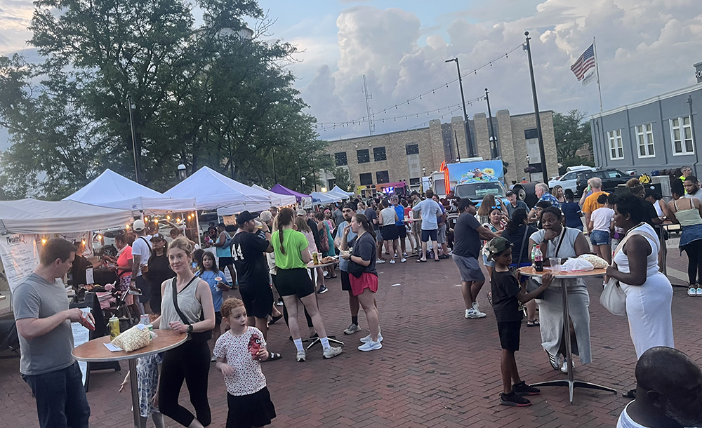 Community gathers in downtown Homewood’s Martin Square for Rock the Block, a Homewood block party organized by the Village of Homewood on the evening of Thursday, June 26. (Nick Ulanowski / H-F Chronicle)