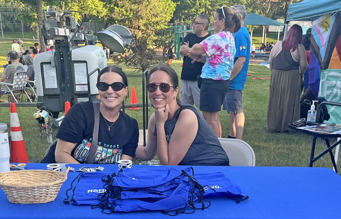 Homewood Communications Manager Antonia Steinmiller, left, and Events Director Marla Youngblood work the Village of Homewood booth at Pride Fest on June 20. (Nick Ulanowski/H-F Chronicle)