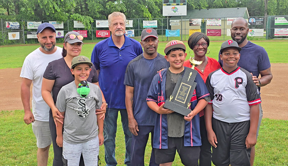 From left, José Correa Sr., Susie Correa, Chris Correa, Rick Lukasik, Hopeton Rowe Sr., José Correa Jr., Raye Rowe, Ashton Rowe and Hopeton Rowe Jr. (Eric Crump/H-F Chronicle)