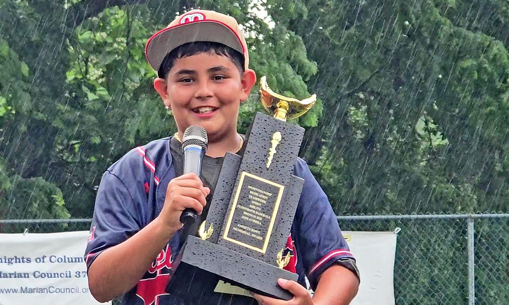 José Correa Jr. says a few words of thanks after receiving the 2025 Jarrett Rowe Award on June 24. (Eric Crump/H-F Chronicle)