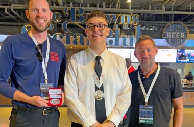 Homewood-Flossmoor High School senior Charley Dieringer, center, was congratulated by teachers Bill Merchantz, left, and Greg Petecki, right, who accompanied him to the Skills USA competition in Atlanta where Dieringer won national honors. (Provided photo)
