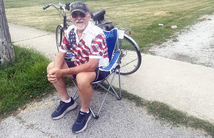 Homewood resident Kirk Powers enjoys the Fourth of July parade in a patriotic shirt.(Nick Ulanowski/ H-F Chronicle)