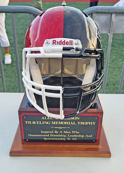 Homewood-Flossmoor retained ownership of the traveling trophy for the annual Alec Anderson Game with Bolingbrook with a 44-30 win. (David P. Funk/H-F Chronicle)