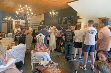 Residents and supporters gather at Beyond Borders Cafe for its grand opening Aug. 9 in Flossmoor. (Jamilah Lewis/H-F Chronicle)