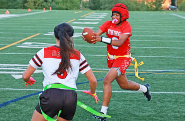 QB Jorie Peters (9) scrambles to the right and breaks the plane for a touchdown. (Benjamin Faoro/H-F Chronicle)