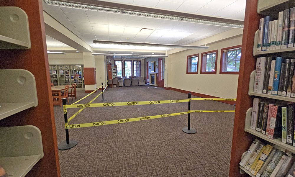 A section on the west side of the Flossmoor Public Library is cordoned off while the village works to solve a small settling of the foundation. (Eric Crump/H-F Chronicle)