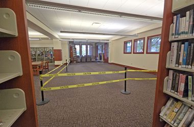 A section on the west side of the Flossmoor Public Library is cordoned off while the village works to solve a small settling of the foundation. (Eric Crump/H-F Chronicle)