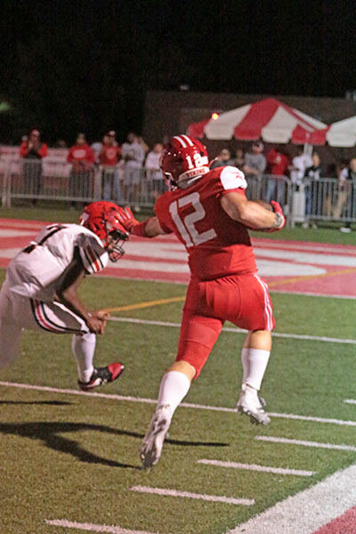 Ryan Koprowski (12) returns a pick inside the 5-yard line, giving the offense a great position to get on the board. Vikings would go on to score using the field position. (Benjamin Faoro/H-F Chronicle)