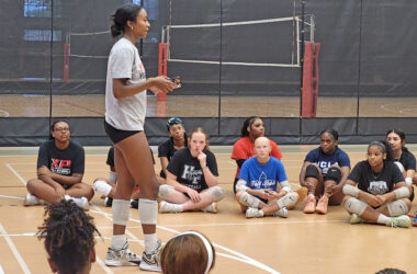 Senior Kymora Scott gives a speech to all levels of H-F girls volleyball before a joint practice Aug. 21. (David P. Funk/H-F Chronicle)