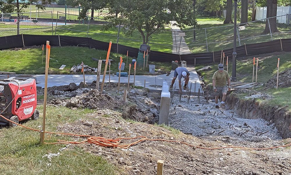 To make certain all children will have access to the planned playground improvements at Irwin Park in Homewood, an ADA-compliant ramp is being installed. (Marilyn Thomas/H-F Chronicle)