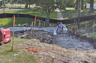To make certain all children will have access to the planned playground improvements at Irwin Park in Homewood, an ADA-compliant ramp is being installed. (Marilyn Thomas/H-F Chronicle)