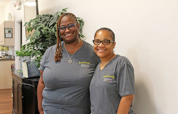 ProjectKennedy_BlanketDrive#2_web Project Kennedy Co-Founder and Executive Director Darnesha Evans with President and Program Director Ashley Carrington at the Blanket Drive. (Nuha Abdessalam/H-F Chronicle)