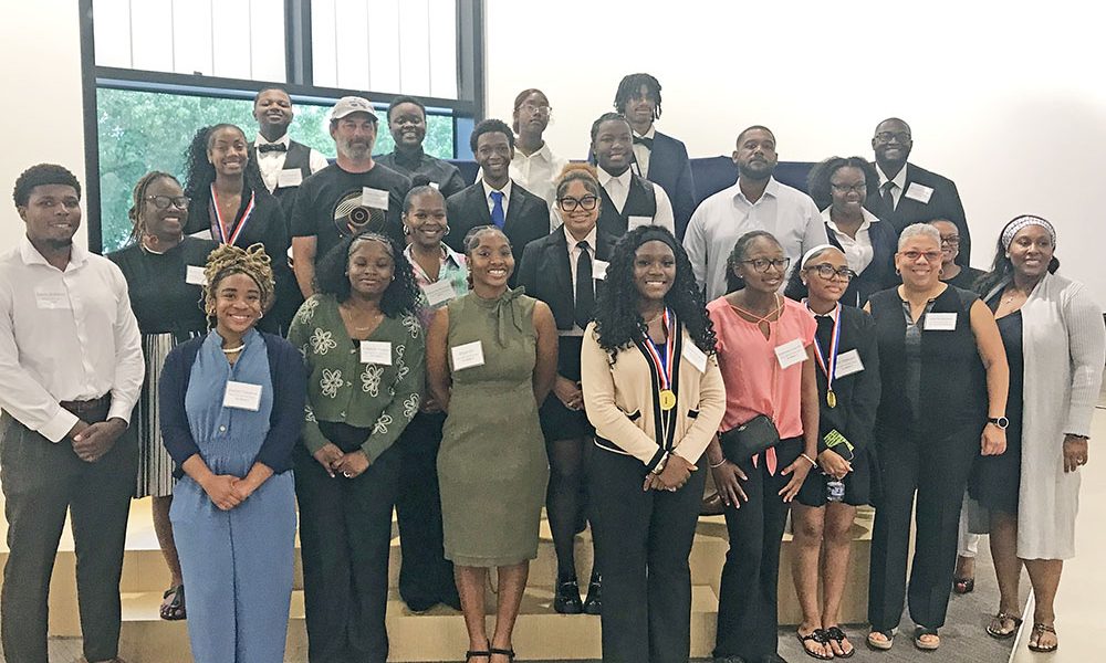 You Matter 2's NextGEN interns pose with judges and You Matter 2 staff on Pitch Day. (Lolita Cusic/H-F Chronicle)