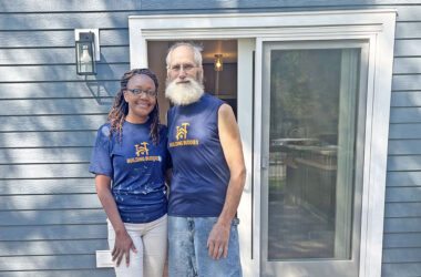 Sarana Lee, left, and Dan Warning stand on the deck of the house they built at 18462 Dixie Highway in Homewood. (Nick Ulanowski / H-F Chronicle)