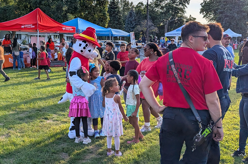The Flossmoor Fire Department brought Marshal from Paw Patrol to District 161's back-to-school party. He earned lots of hugs. (Chris Weber/H-F Chronicle)