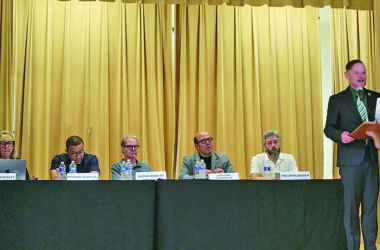 Flossmoor Arts Council founder Troy Holmes, right, introduces film industry professionals and government officials on the panel Sept. 13, 2025, to discuss how film projects can benefit a community. From left are Christine Dudley, Michael Scott Jr. , Peter Hawley, Anthony Barracca and Phil Plowden. (Eric Crump/H-F Chronicle)