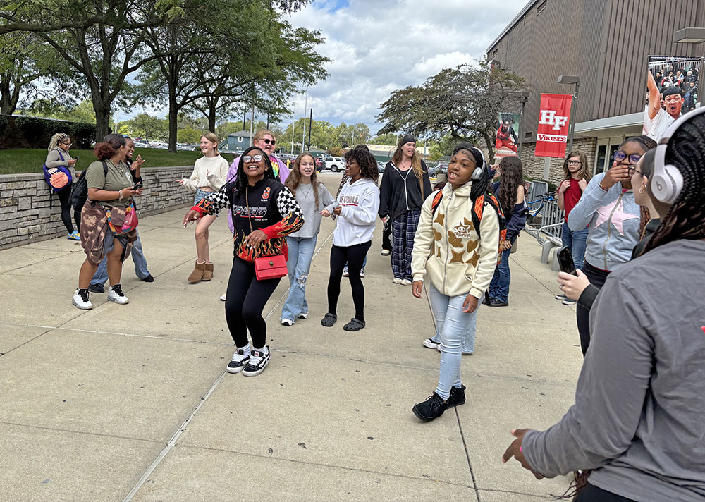 Students give out a call "End the violence, no more guns" at the end of a noon rally at Homewood-Flossmoor High School Friday, Sept, 5. (Marilyn Thomas/H-F Chronicle)