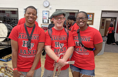 Homewood-Flossmoor High band alumni, from left, Jeremy Wesley, Corey O'Donnell and Kalynn Hunter were among the alumni at the band reunion Sept. 19. (Marilyn Thomas/H-F Chronicle)