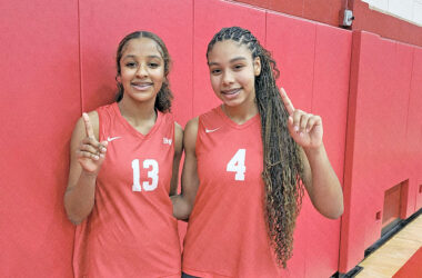 Sisters Cherron (left) and Na'imah Calhoun have a special connection for H-F volleyball. (David P. Funk /H-F Chronicle) New boost
