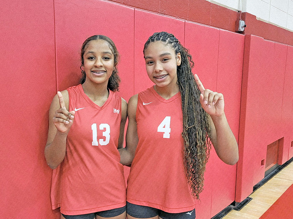 Sisters Cherron (left) and Na'imah Calhoun have a special connection for H-F volleyball. (David P. Funk /H-F Chronicle) New boost