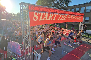 Runners launch themselves west on Flossmoor Road as the Hidden Gem Half Marathon starts at 7:30 a.m. Saturday, Sept. 6, (Eric Crump/H-F Chronicle)