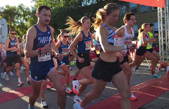 Runners cross the starting line at the beginning of the 2025 Hidden Gem Half Marathon in Flossmoor. (Eric Crump/H-F Chronicle)