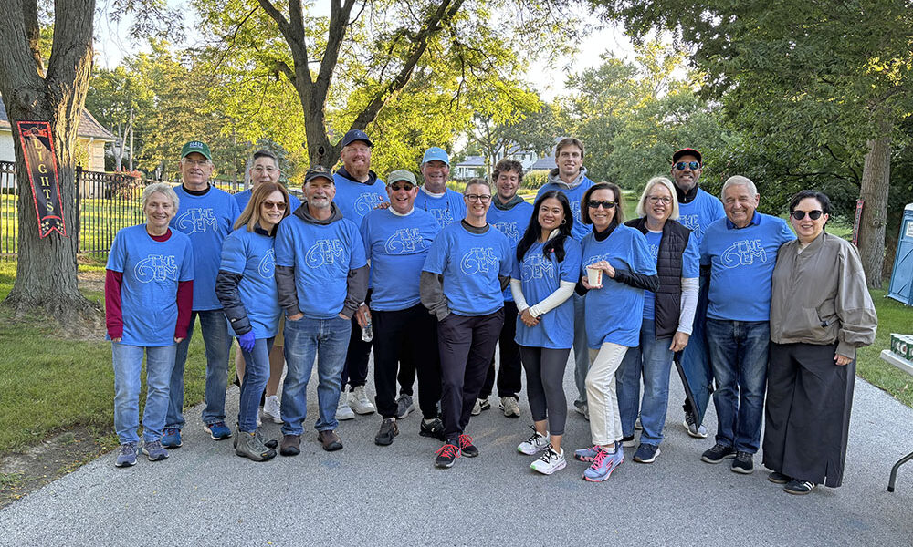 Volunteers at Mile 9 before they manned their stations to assist the more than 1,200 runners at the Hidden Gem Half Marathon. (Marilyn Thomas/H-F Chronicle)