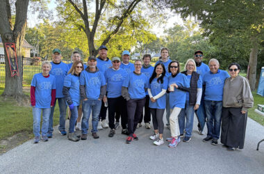 Volunteers at Mile 9 before they manned their stations to assist the more than 1,200 runners at the Hidden Gem Half Marathon. (Marilyn Thomas/H-F Chronicle)